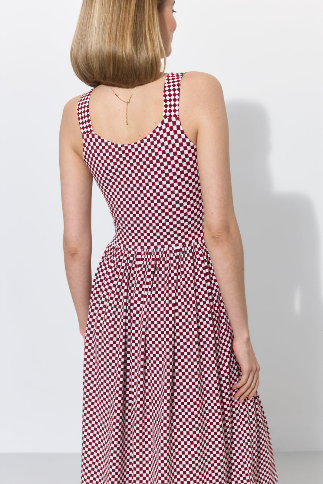 ROMAN HOLIDAYS burgundy chessboard print